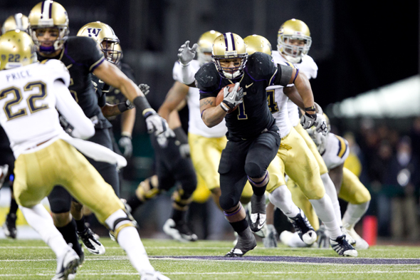 Washington running back Chris Polk is on his way to a second consecutive 1,000-yard rushing season. (Drew McKenzie/Sportspress Northwest)