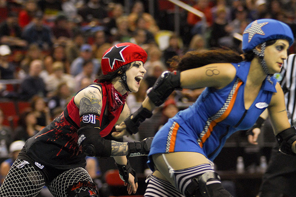 The Sockit Wenches, right, and Grave Danger skate during a showdown last year. / Chris Jones