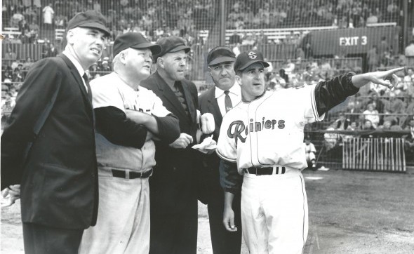 Manager Johnny Pesky (pointing) is joined at the Rainiers' 1961 home opener by umpire Doug Harvey, Whitey Wietelman, Bob St. Clair and Pat Orr. / David Eskenazi Collection